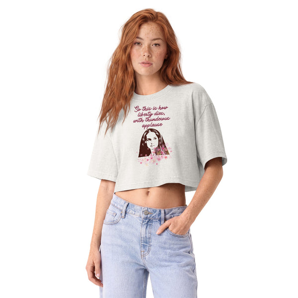 Woman wearing a vintage garment-dyed cropped tee featuring the quote "So This Is How Liberty Dies." Relaxed washed Bella + Canvas cropped t-shirt inspired by Padmé, the prequel trilogy, Galaxy's Edge outfits, and subtle fandom fashion.