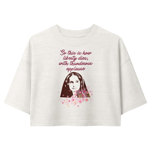 Woman wearing a vintage garment-dyed cropped tee featuring the quote "So This Is How Liberty Dies." Relaxed washed Bella + Canvas cropped t-shirt inspired by Padmé, the prequel trilogy, Galaxy's Edge outfits, and subtle fandom fashion.