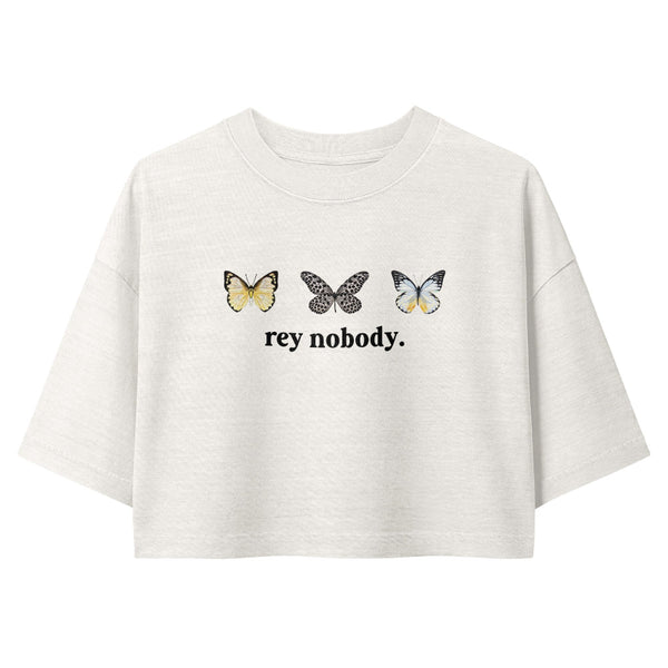 a vintage garment-dyed cropped tee featuring a Rey Nobody inspired design. Relaxed washed Bella + Canvas cropped t-shirt for Rey fans, sequel trilogy lovers, Galaxy's Edge outfits, and subtle fandom fashion.
