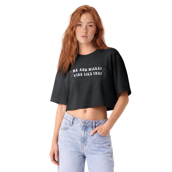 Woman wearing a vintage garment-dyed cropped tee featuring a Karma x Mickey inspired design. Relaxed washed Bella + Canvas cropped t-shirt for Swifties, Disney adults, Disneyland outfits, and Disney World vacations.