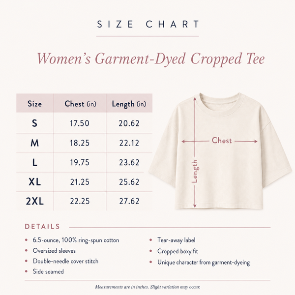 Size chart graphic for a women's garment-dyed cropped tee, showing a size table from S to 2XL with chest and length measurements, plus a labeled illustration of the garment with chest and length arrows.