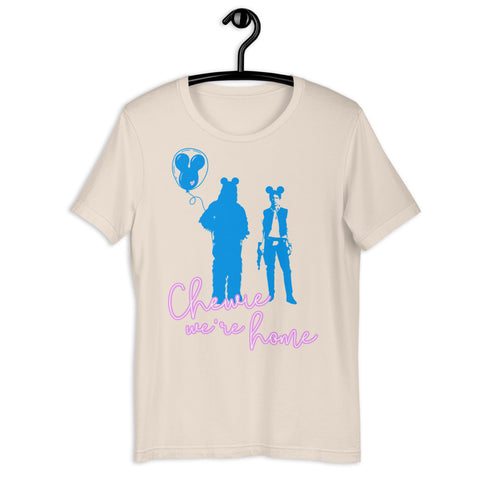 Chewie We're Home Shirt Disney Parks graphic tee Disneyland Disney WORLD Chewbacca holding a Mickey balloon with red heart and Han Solo wearing Mickey ears holding a blaster Neon 90's effect design font Cream with blue and purple vintage fashion